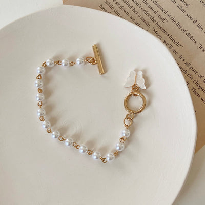 Pulsera de Perla con Dije Mariposa Hada - Elegancia Femenina - Image 9