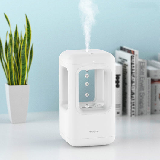 White anti-gravity water drop humidifier with visible mist output and 'Winben' brand name, on a white stand. - Image 8