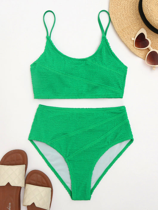 Woman in a solid green textured high-waisted bikini, holding a disposable camera on a sunny beach. - Image 10