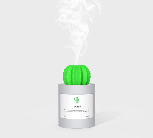 Person holding a glowing white cactus humidifier with a green top; inset shows five white humidifier filter sticks. - Image 4