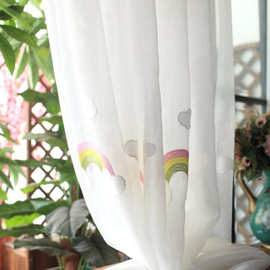 White sheer gauze curtain with colorful embroidered rainbows and grey clouds, suitable for a child's room. - Image 4