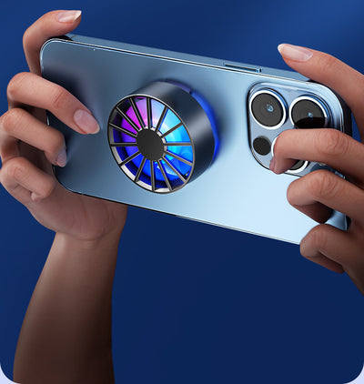 White magnetic phone cooler with blue and pink RGB lights, attached to a silver smartphone, against an icy blue background. - Image 9