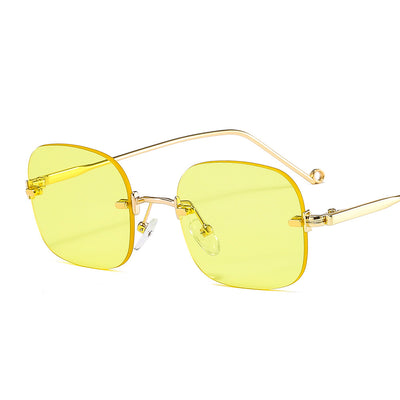 Frameless square sunglasses featuring vibrant blue lenses and sleek gold-colored metal temples and bridge. - Image 16
