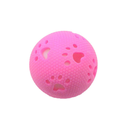 Green TPR hollow pet ball with honeycomb texture and paw print cutouts, designed for play. - Image 3
