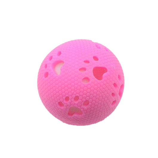 Green TPR hollow pet ball with honeycomb texture and paw print cutouts, designed for play. - Image 3