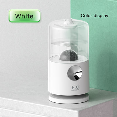 Light blue smart rotary projection humidifier with a clear water tank and a cute cat-shaped top. - Image 18