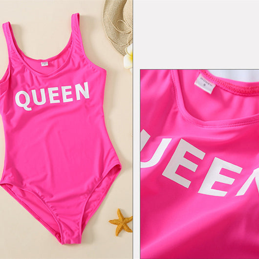 Rose pink one-piece swimsuit with 'QUEEN' printed in white on the front, featuring a scoop neck and tank straps. - Image 12