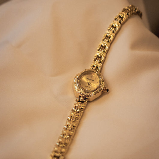 Reloj Antiguo de Cobre Dorado con Tiras Artesanales - Image 7