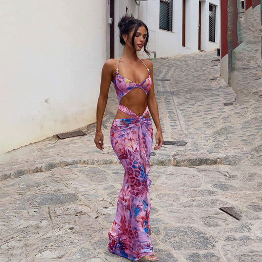 Women's two-piece swimsuit with a halter bikini top and a matching long skirt, featuring a vibrant tropical and animal print. - Image 3