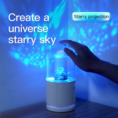 Light blue smart rotary projection humidifier with a clear water tank and a cute cat-shaped top. - Image 3