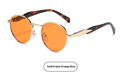 Silver metal round frame sunglasses with dark grey lenses and black temples, offering UV protection for women. - Image 23