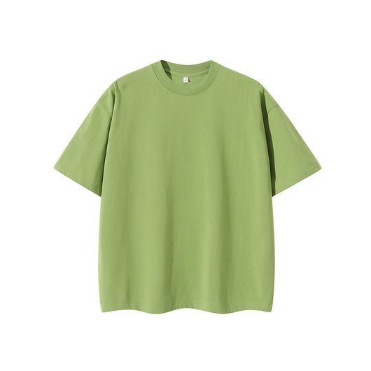 Moss green short-sleeve cotton t-shirt with a crew neck and a relaxed, oversized fit. - Image 6