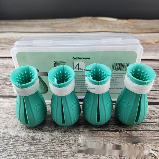 Four teal rubber cat paw covers with white hook-and-loop straps and paw print details, designed for anti-scratch protection. - Image 4