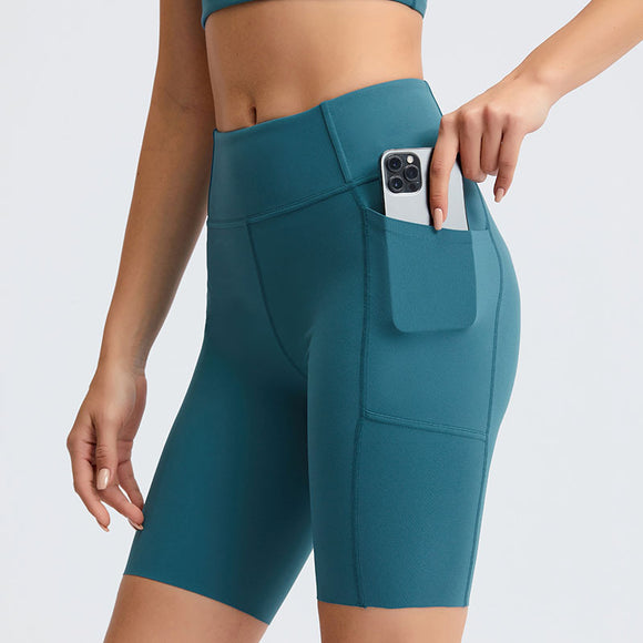 Pantalones Yoga Cintura Alta Ajustados con Bolsillos Laterales en Tela Nude Texturizada
