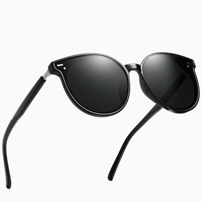 Transparent gray round frame polarized sunglasses with black-gray lenses on a white background. - Image 17