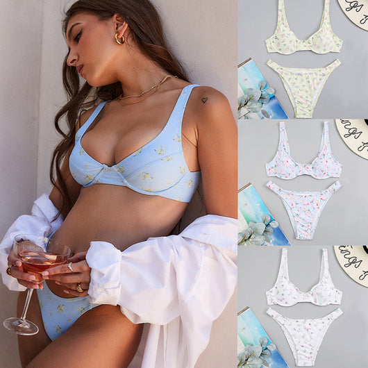 Light blue floral bikini with pink and yellow flowers, featuring an underwire top and high-cut bottom.