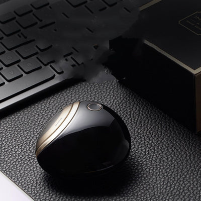 White egg-shaped electric nail clippers trimmer with a gold-toned accent and a single control button. - Image 18