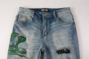 Jeans Slim Fit Azul con Pliegues, Detalles de Piel de Serpiente y Rotos Bordados - Image 6