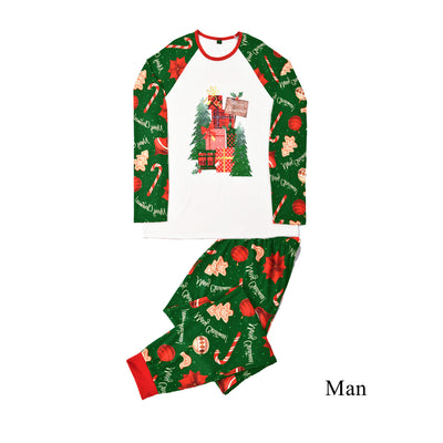 Green baby Christmas pajama romper with red trim, featuring candy canes, ornaments, gingerbread men, and poinsettias. - Image 2