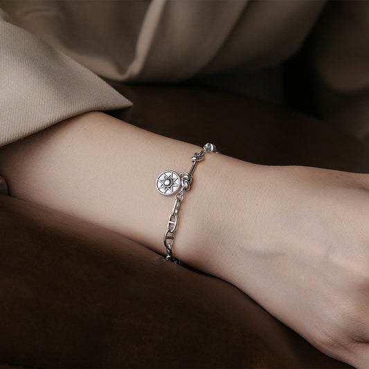 Pulsera Estrella de Ocho Puntas con Cadena Asimétrica en Plata Esterlina