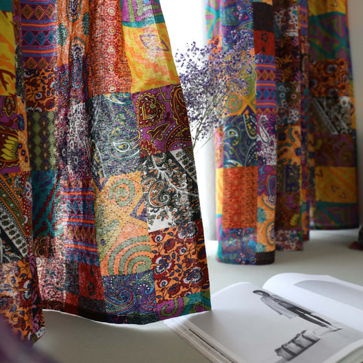 Bohemian retro style cotton linen curtains with a vibrant geometric patchwork pattern, one tied back with a rope. - Image 2