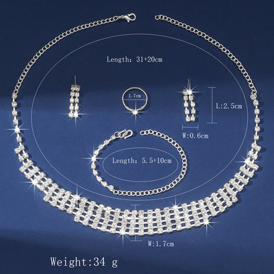 Sparkling four-piece jewelry set with a rhinestone necklace, bracelet, drop earrings, and a simple band ring on a model. - Image 5