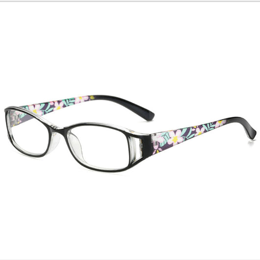 Women's lightweight fashion reading glasses with a red frame and colorful floral print temples. - Image 5