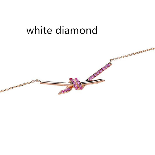 Collar Cruz con Diseño de Diamantes y Nudos en Oro Rosa 18K - Image 5