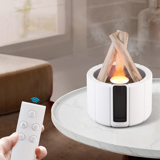 Dark gray simulated flame aromatherapy machine with a remote control, emitting a warm, flame-like light and mist. - Image 9