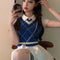 Blue vest and white top