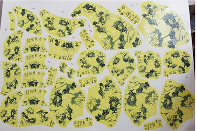 Sheet of gold ceramic decals with ornate, symmetrical designs, ideal for pottery and craft decoration. - Image 9