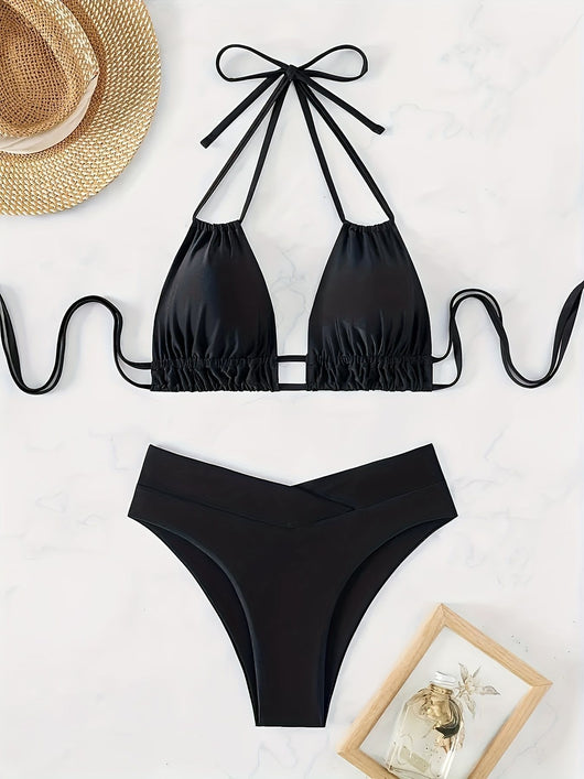 Women's black deep V push-up bikini with lace-up back and high-waisted bottom, laid flat on white marble. - Image 6