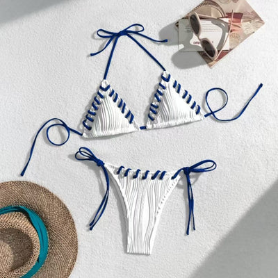 Light blue ribbed bikini swimsuit with pink tie straps and lacing detail, featuring a triangle top and thong bottom. - Image 13