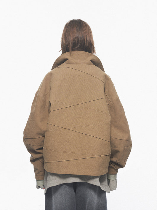 Chaqueta de Cuero Patchwork con Detalles en Relieve Geométrico - Image 10