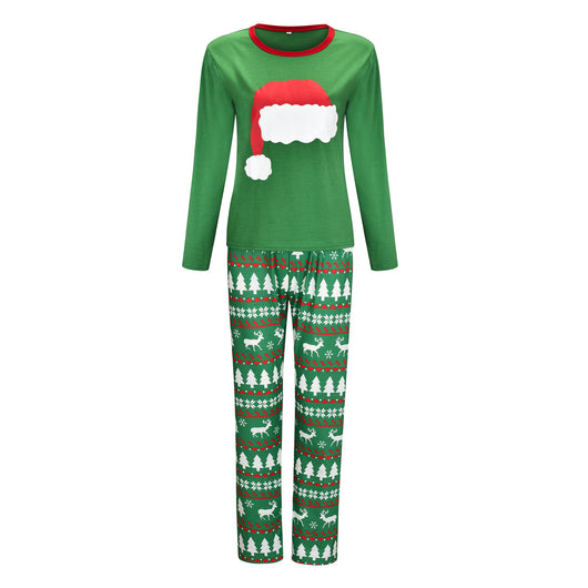 Green Christmas family pajama sets with Santa hat graphic tops and pants featuring reindeer, trees, and snowflakes. - Image 5