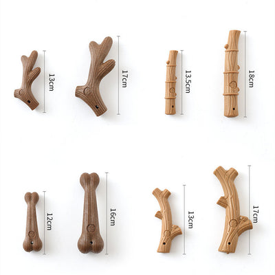 Brown bone-shaped dog chew toy with a paw print detail and small hole, designed for small dogs. - Image 7