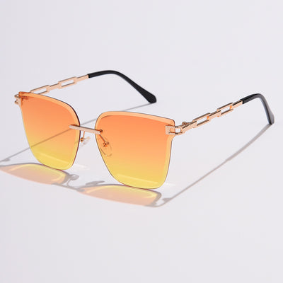 Frameless oversized square sunglasses with brown gradient lenses and gold-tone metal temples, featuring decorative black studs. - Image 17
