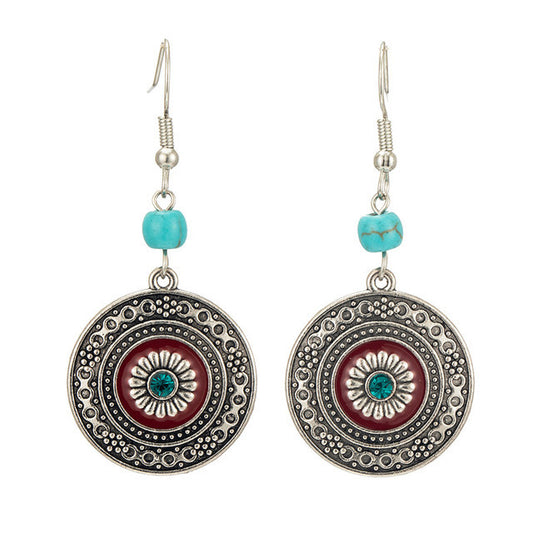 Aretes Vintage Tallados Hueco con Borla - Estilo Europeo Temperamento Retro - Image 2