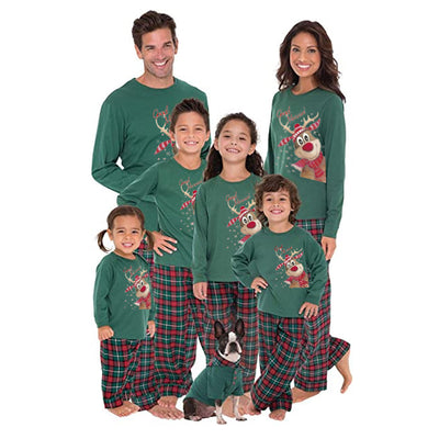 Family of five and a Boston Terrier wearing matching green long-sleeved Christmas pajamas with reindeer graphic and red plaid pants. - Image 2