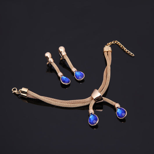 Conjunto de Joyería Dorada de Cuatro Piezas: Collar y Aretes - Image 3