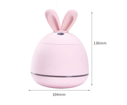 Cute pink rabbit desktop mini USB humidifier with a silver band, featuring a compact egg shape and bunny ears. - Image 14