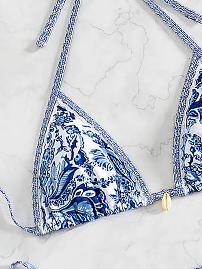 Red floral print triangle cup bikini set with matching bottom, featuring a small gold charm on the top. - Image 45