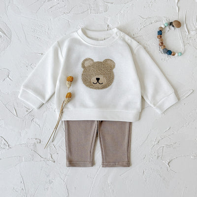 White long-sleeve baby hoodie with a brown bear print and matching ribbed beige sweatpants set. - Image 2