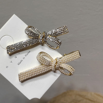 Pasador de Cabello Perla Diamante con Lazo Metálico