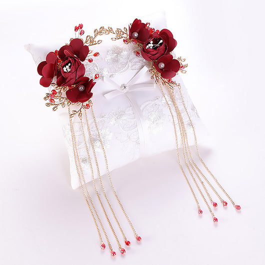 Tocado nupcial con flores rojas y horquilla china - Image 7