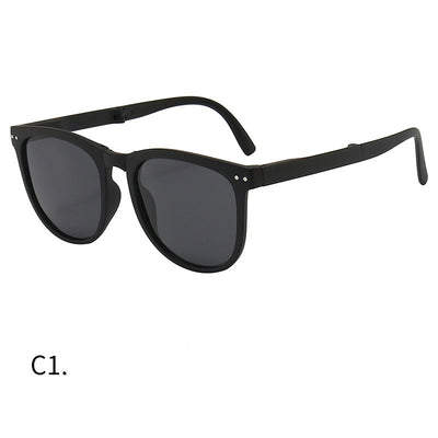 Light brown foldable women's sunglasses with round frames and brown polarized lenses on a white background. - Image 7