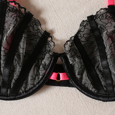 Black lace bra and thong set with hot pink harness straps, gold-tone rings, and a matching hot pink choker. - Image 12