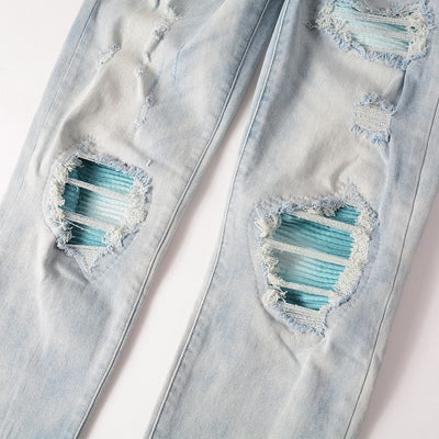 Jeans Azul Cielo Desgastado con Roturas Vintage para Hombre - Image 28