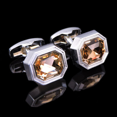 Gemelos Plateados con Cristal Naranja Geométrico