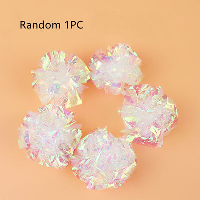 Five iridescent crinkle paper balls, likely cat toys, arranged in a circle on a peach background. - Image 14